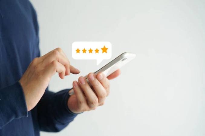 Five stars next to cell phone show the concept of third party rehab reviews
