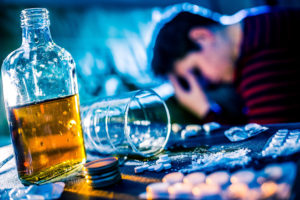 Alcohol Abuse is Drug Abuse | Alcoholism is a Disease | Find Addiction Rehabs | Find Addiction Rehabs | Man who is abusing alcohol and drugs