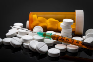 Drug Abuse By State | Find Addiction Rehabs | Prescription drugs on matte background such as Xanax and Morphine
