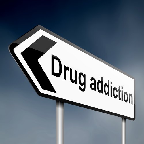Drug Addiction - Image of a road sign pointing to the left with text "Drug Addiction".