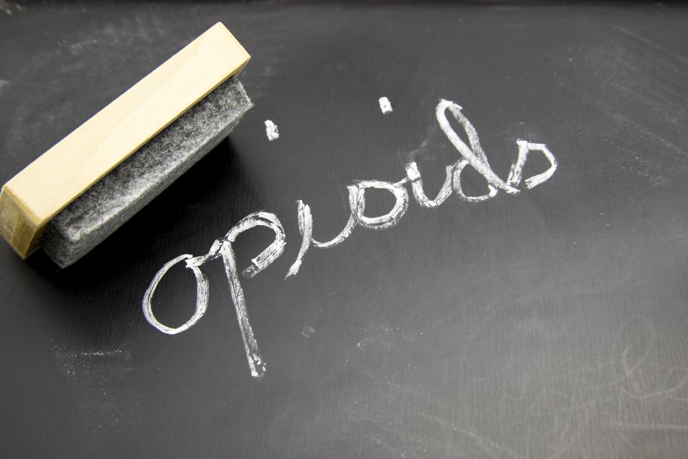 Opioid Disposal Kits - Opioids written on a chalk board.