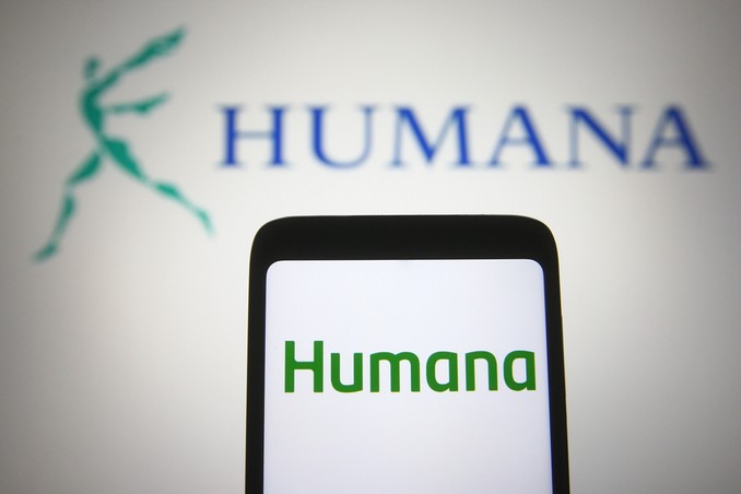Computer screen and mobile phone showing Humana Insurance logos, with emphasis on rehabs that accept Humana Insurance