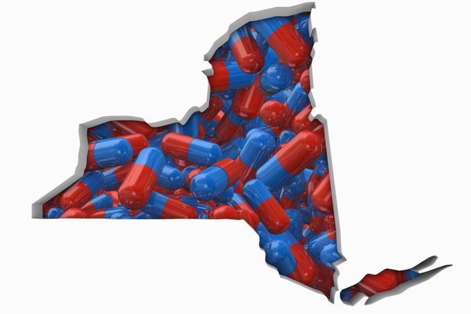 Outline of New York state filled with red and blue prescription pills, to illustrate GHI insurance coverage for rehabs