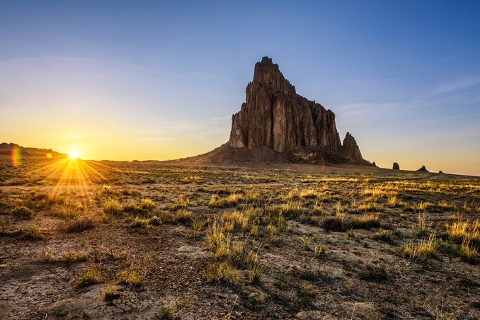 Shiprock looms over the Navajo Nation, in the beautiful land of Enchantment, to show the concept of New Mexico alcohol and drug rehab centers and their ability to heal the spirit