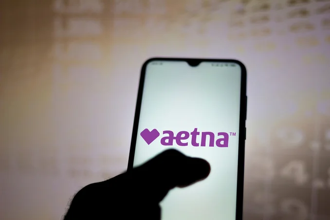 A mobile screen shows the concept of rehabs that accept Aetna insurance