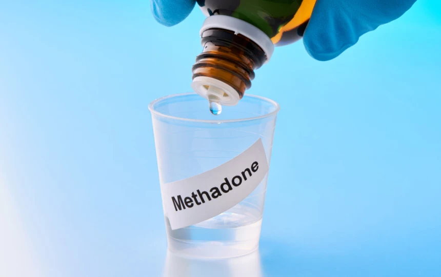 Methadone being dispensed shows the concept of causes of methadone withdrawal