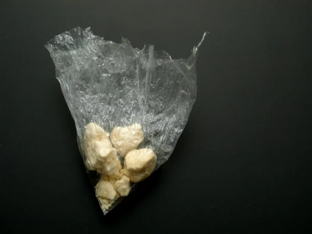 Crack addiction concept shown by rocks of crack in a baggie