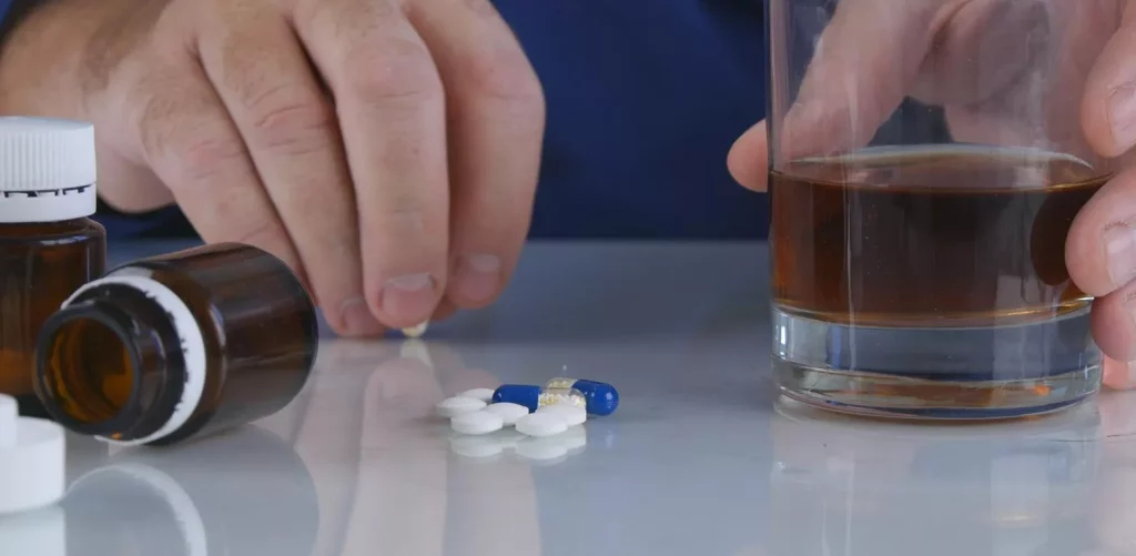 A man holding Phentermine And Alcohol