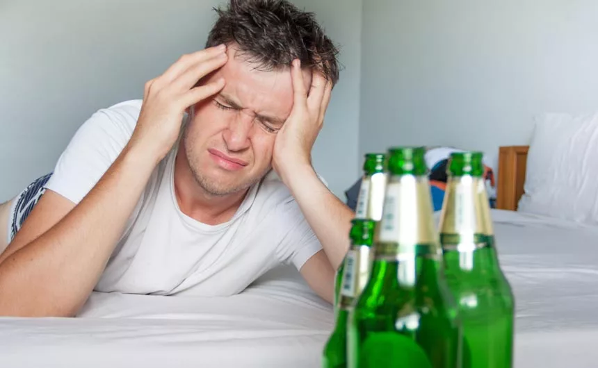 A man suffers from hangover anxiety without knowing Find Addiction Rehabs can help